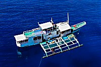 große Banca (Auslegerboot) des Dugong Dive Centers