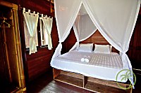 Bungalow mit Doppelbett im Ceningan Resort